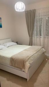 Ein Bett oder Betten in einem Zimmer der Unterkunft Apartament Orestiada
