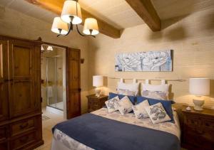 Кровать или кровати в номере Betty Cake B&B