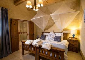 Кровать или кровати в номере Betty Cake B&B