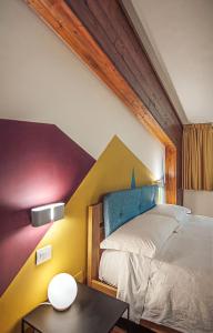 Postelja oz. postelje v sobi nastanitve Chalet Lago