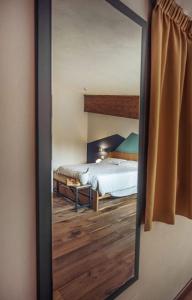 Postel nebo postele na pokoji v ubytování Chalet Lago