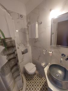 Koupelna v ubytování Xenios Zeus