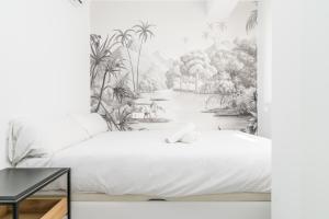 Кровать или кровати в номере Suite Homes Penthouse Capuchinos