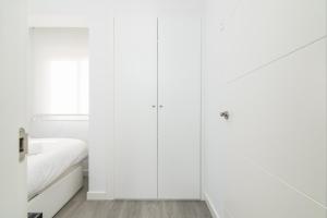 Posteľ alebo postele v izbe v ubytovaní Suite Homes Penthouse Capuchinos