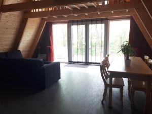 Posezení v ubytování A-frame volledig vrijstaande woning