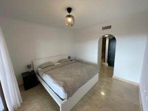 A bed or beds in a room at Buena Vista D3