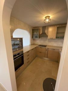 A kitchen or kitchenette at Buena Vista D3