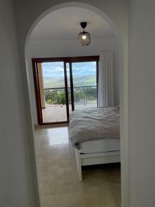 A bed or beds in a room at Buena Vista D3