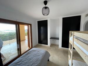 A bed or beds in a room at Buena Vista D3