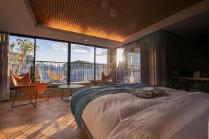Rúm í herbergi á Asakusa Kokono Club Hotel
