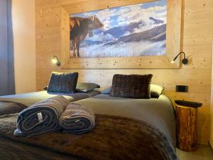 Posteľ alebo postele v izbe v ubytovaní Carosello Lodge Livigno