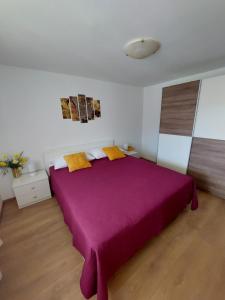 Postel nebo postele na pokoji v ubytování Apartmani Ana