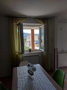 Postel nebo postele na pokoji v ubytování Apartmani Ana
