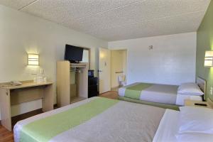 Postel nebo postele na pokoji v ubytování Motel 6 Austin, TX - Central Downtown UT