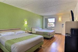 Postel nebo postele na pokoji v ubytování Motel 6 Austin, TX - Central Downtown UT