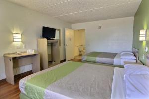 Postel nebo postele na pokoji v ubytování Motel 6 Austin, TX - Central Downtown UT