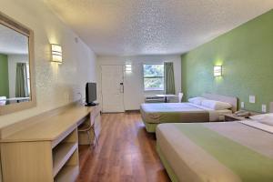 Postel nebo postele na pokoji v ubytování Motel 6 Austin, TX - Central Downtown UT
