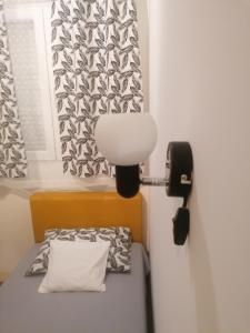 Postel nebo postele na pokoji v ubytování Apartman Centar 2