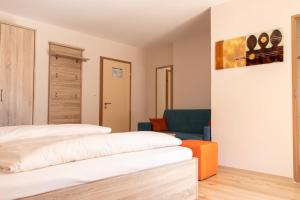 Postel nebo postele na pokoji v ubytování Landgasthof Zum Wolfsberg