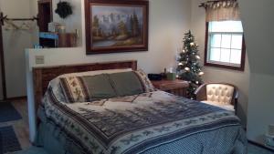 A bed or beds in a room at Trickling Waters Retreat