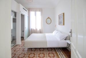 Posteľ alebo postele v izbe v ubytovaní DOMUS ALERIA Deluxe Rooms
