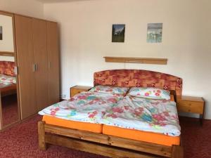 Posteľ alebo postele v izbe v ubytovaní Apartman Hruba Skala
