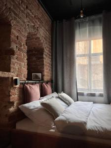 Posteľ alebo postele v izbe v ubytovaní Pudrowy Apartament OLD TOWN design