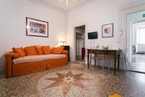 TV a/nebo společenská místnost v ubytování Relais Pacinotti Apartments