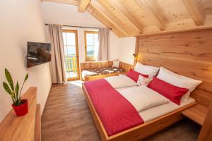 Ένα ή περισσότερα κρεβάτια σε δωμάτιο στο Gladerhof