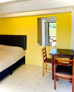 En eller flere senge i et værelse på Atlantic Hostel Punta del Este