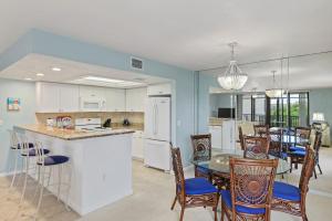 Updated Two Bedroom Beach Residence at Compass Point- Great Amenities with Bikes