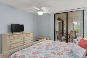 Updated Two Bedroom Beach Residence at Compass Point- Great Amenities with Bikes