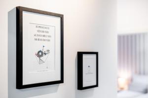 Ένα ή περισσότερα κρεβάτια σε δωμάτιο στο VIVID - Ideal für 4 - Strandnähe mit 2 Terrassen - 2 SZ & WZ