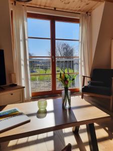 Posezení v ubytování Hof Ruemland Ferienwohnungen