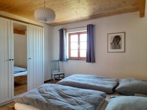Postel nebo postele na pokoji v ubytování Hof Ruemland Ferienwohnungen