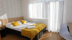 Łóżko lub łóżka w pokoju w obiekcie Family Homes - Dom Wakacyjny EDA