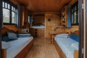 Ein Bett oder Betten in einem Zimmer der Unterkunft Domaine d'Escapa