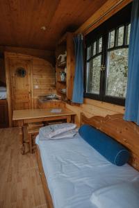 Ein Bett oder Betten in einem Zimmer der Unterkunft Domaine d'Escapa