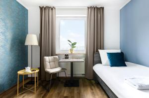 Postel nebo postele na pokoji v ubytování Hotel Zielonki