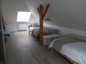 Ένα ή περισσότερα κρεβάτια σε δωμάτιο στο Les Chambres d Odile +22 φωτογραφίες