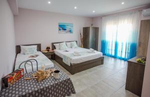 A bed or beds in a room at Studio Elena