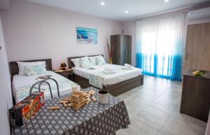 A bed or beds in a room at Studio Elena