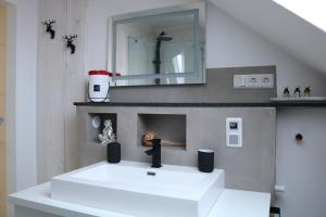 Koupelna v ubytování Appartement Tischi
