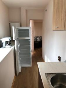 O bucătărie sau chicinetă la Central House