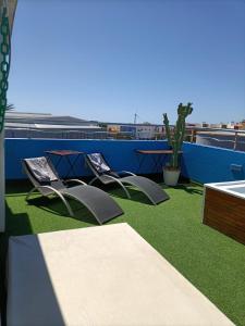 Fotografia z galérie ubytovania Ático Arinaga con vistas , jacuzzi , terraza y barbacoa v destinácii Arinaga