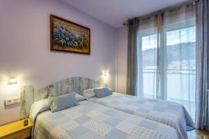 Posteľ alebo postele v izbe v ubytovaní Paseo Antzieta 31. 1E