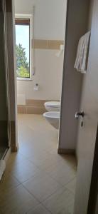 A bathroom at Hotel Conca d'Oro