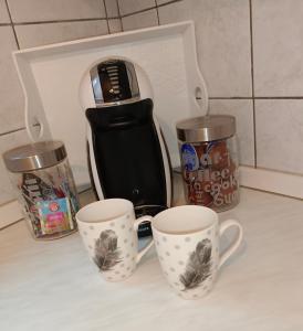 Příslušenství pro přípravu čaje a kávy v ubytování Ubytování na Goethovce-apartmán