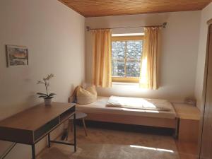 Кровать или кровати в номере Villa im Wald