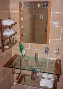 Koupelna v ubytování Hotel Rancho Don Cesar